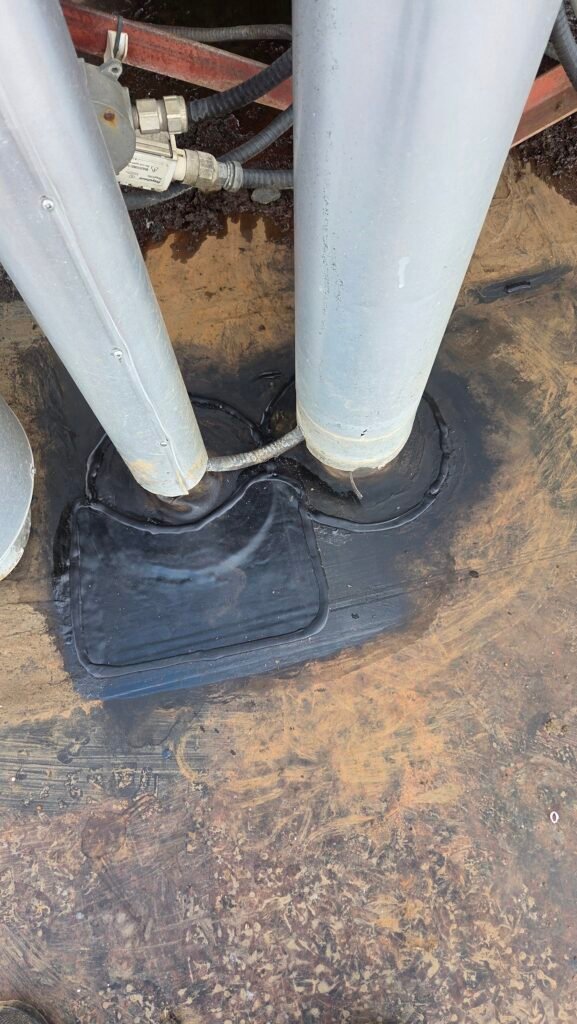 Commercial Flat Roof Leak Repair in Mission 4 A cleaned and re-patched area on the EPDM roof with lap sealant around the patch edges, in Mission.