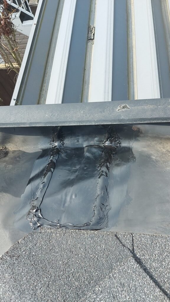 Finished commercial grade membrane patch in a hidden gutter in Richmond.