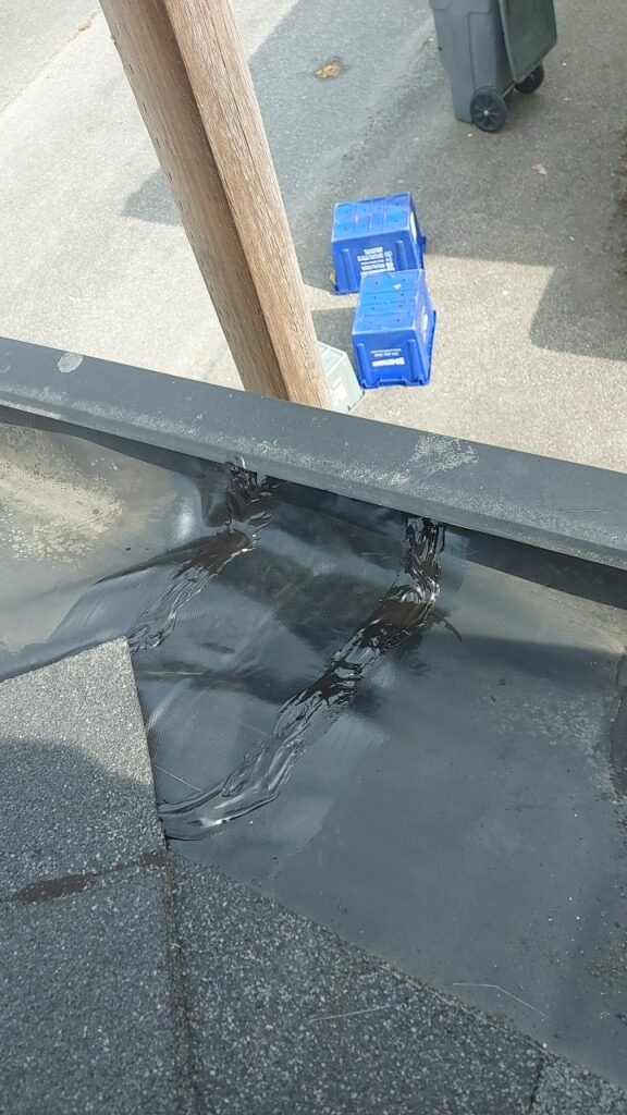 Commercial grade patch membrane bonded into a hidden gutter on a Richmond roof.