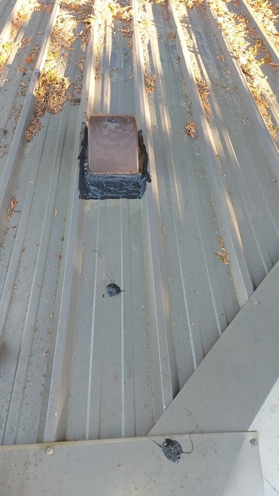 Metal Roof Vent Leak in Aldergrove: Why 50-Year Roofs Still Need Maintenance 1 Plastic vent penetration on a metal roof in Aldergrove.