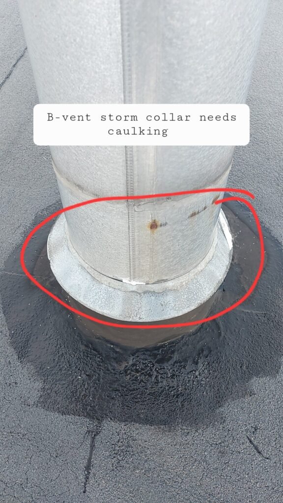 B-vent storm collar needing caulking on a torch-on flat roof in Aldergrove.